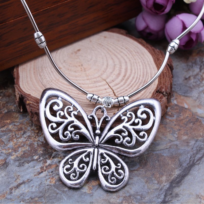 Vintage Ethnic Charm Butterfly Pendant Necklace - Intricate Geometric Carvings, Hollow Design, Ethereal Beauty for Everyday Glam - Image 13